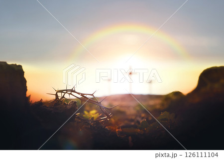 Cross, crown of thorns, rainbow, Holy Week background symbolizing the sacrifice, suffering, and resurrection of Jesus Christ 126111104