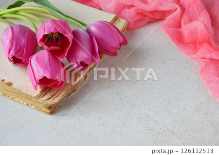 Beautiful pink tulip flowers background for Birthday, Mother's day, Valentine's Day, March 8, Wedding concept greeting card. Floral decorative frame. Festive background. Copy space for text 126112513
