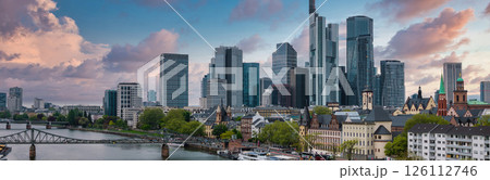 Aerial view of Frankfurt, Germany, featuring modern skyscrapers like Commerzbank Tower, the Main River, Eiserner Steg bridge, and historic architecture. Aerial view of Frankfurt, Germany, featuring modern skyscrapers like Commerzbank Tower, the Main River, Eiserner Steg bridge, and historic architecture. 126112746