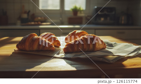 Bakers hands dust powdered sugar over a chocolate cake in dramatic light. Elegant scene for dessert, baking, and gourmet themes. 126115774