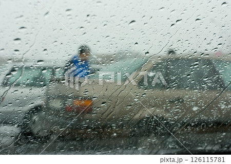 trafic jam in the rainny day, view via front window of car 126115781