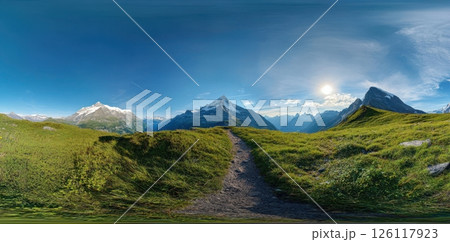 Beautiful mountain landscape at sunrise with winding path through green grass leading to snow-capped peaks in soft light panoramic view concept of travel wellness tourism nature art 126117923