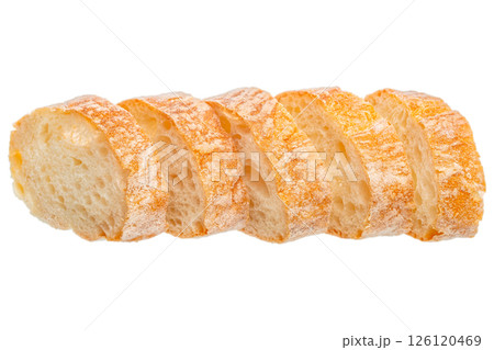 Slices of fresh baked wheat baguette isolated on white background. French bread close-up Slices of fresh baked wheat baguette isolated on white background. French bread close-up 126120469
