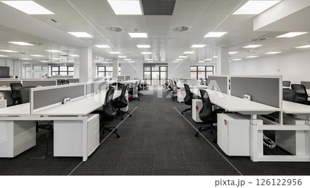 Spacious modern office with open-plan design and ergonomic furniture 126122956