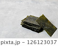 Homemade nori chip on neutral light background 126123037