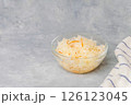 Top view of plate with sauerkraut on neutral light background 126123045