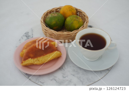 two pieces of traditional Indonesian sponge cake known as kue pukis two pieces of traditional Indonesian sponge cake known as kue pukis 126124723