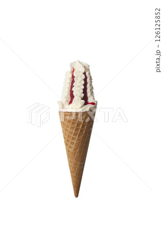 Ice cream in a waffle cone with strawberry or raspberry topping isolated on white background 126125852