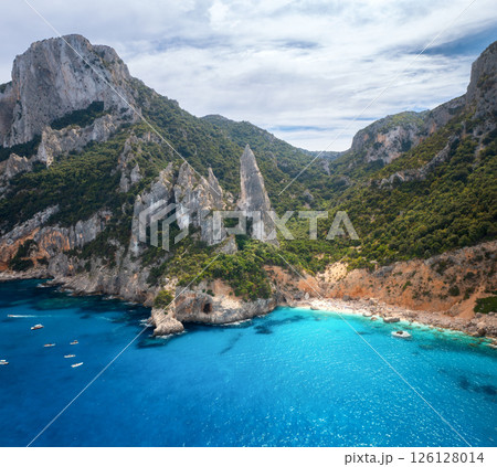 Aerial view of rocks and mountains, blue bay, beach, boats Aerial view of rocks and mountains, blue bay, beach, boats 126128014