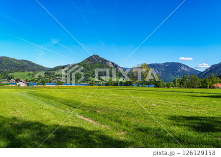 Hiking trail around Lake Schliersee in the bavarian alps at Schliersee, Upper Bavaria, Germany in Europe 126129158
