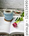 Pink tulips, an open book and a mug of freshly brewed coffee or tea. Spring set. Flatley layout 126130490