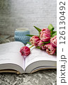 Pink tulips, an open book and a mug of freshly brewed coffee or tea. Spring set. Flatley layout 126130492