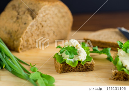 Healthy breakfast with rye bread and vegetable spread Healthy breakfast with rye bread and vegetable spread 126131106