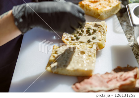Creating a Savory Sandwich Using only the Freshest Ingredients Available for Your Enjoyment 126131258