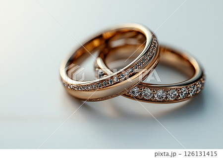 Pair of Wedding Rings on a white background. Pair of Wedding Rings on a white background. 126131415
