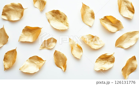 Top View Of Numerous Edible Gold Leaf Pieces On White Surface: A Luxurious And Exquisite Display Of Culinary Elegance. 126131776