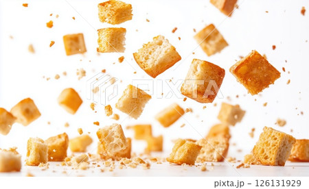 Crispy Bruschetta Crackers And Crunchy Bread Croutons On A White Platter 126131929