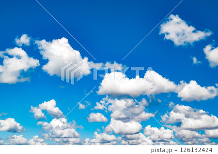 blue sky with white cumulus clouds on clear day blue sky with white cumulus clouds on clear day 126132424