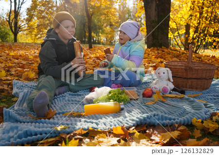 Crisp Air, Falling Leaves, and a Perfect Picnic Under the Autumn Sky 126132829