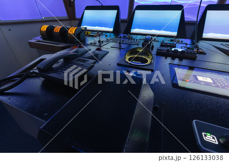Marine navigation simulator. Control center on a modern ship bridge 126133038