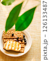 Grilled Bread With Berries and Jam on a Light Table, With Green Leaves in the Background; a Cafe Food Concept 126133487