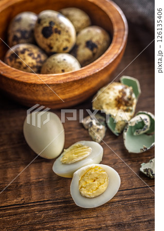 Boiled quail eggs on wooden table. Boiled quail eggs on wooden table. 126135406