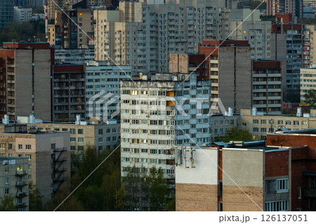 urban landscape with tall buildings and several trees, residential area, multi-storey buildings. urban landscape with tall buildings and several trees, residential area, multi-storey buildings. 126137051