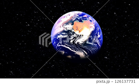 Earth rotating slowly within dark cosmic space, bright luminous beam emerging from planetary background, creating mesmerizing astronomical spectacle with mysterious glowing radiance 126137731