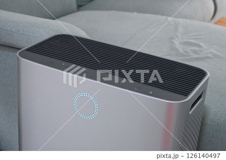 air purifier technology clean dust pm 2.5 in living room inside home for healthy care 126140497