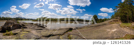 Lava rock formation known as the Love Stone on the bank of the Biya River in Altai, Russia. Concept of sacred natural landmarks and emotional symbolism in wild nature 126141326