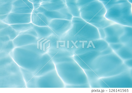Blue swimming pool water surface and ripple wave background. Summer abstract reflection. Blue swimming pool water surface and ripple wave background. Summer abstract reflection. 126141565