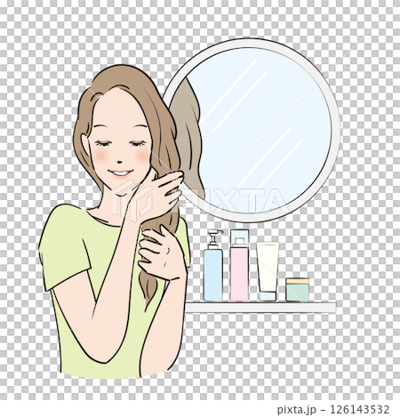 A woman with long hair carefully taking care of her hair 126143532