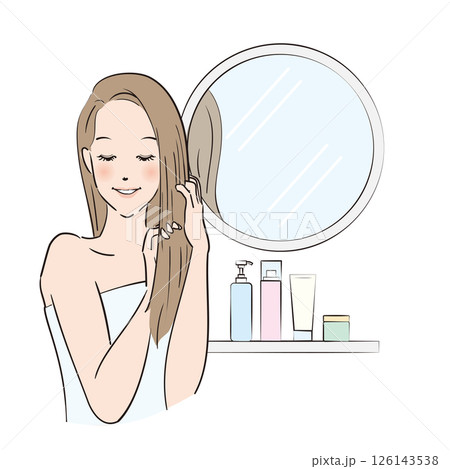 丁寧にヘアケアをするロングヘアの女性 126143538