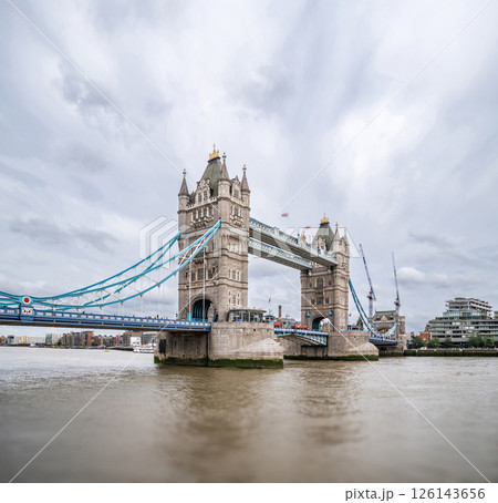 Tower Bridge Spans the Thames with Its Gothic Towers and Blue Cables, Remaining a Must-See Symbol of the City for Visitors in July 2023 Tower Bridge Spans the Thames with Its Gothic Towers and Blue Cables, Remaining a Must-See Symbol of the City for Visitors in July 2023 126143656