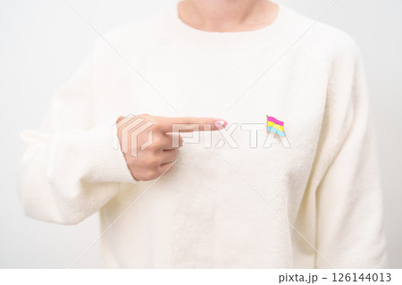Pansexual Visibility Day and Panromantic May Awareness Day and LGBT pride month concept. hand holding pink, yellow and blue heart shape for Lesbian, Gay, Bisexual, Transgender and Marriage Equality 126144013