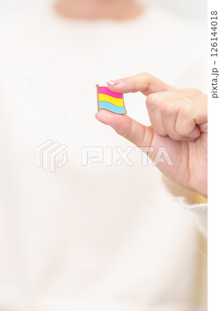 Pansexual Visibility Day and Panromantic May Awareness Day and LGBT pride month concept. hand holding pink, yellow and blue heart shape for Lesbian, Gay, Bisexual, Transgender and Marriage Equality 126144018