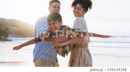 Parents, boy and airplane with lift at beach, happy and playful with games, love and bonding on vacation. People, man and woman with child, flight and excited on holiday, summer and ocean in Colombia Parents, boy and airplane with lift at beach, happy and playful with games, love and bonding on vacation. People, man and woman with child, flight and excited on holiday, summer and ocean in Colombia 126144166