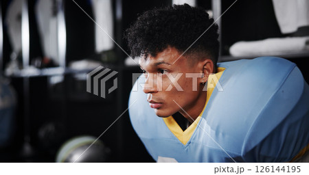 Thinking, man and player for football in locker room of match ideas, game plan and event half time. Athlete, male person and getting ready with thoughts, sports tournament and competition preparation 126144195