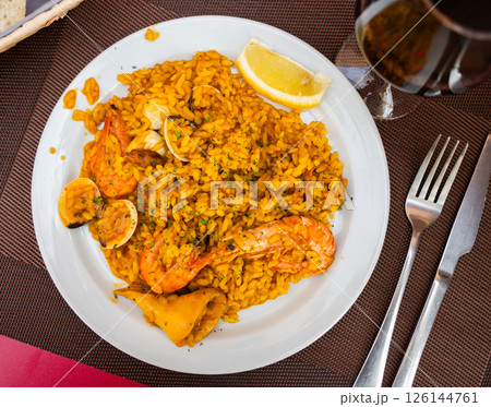 Traditional spanish dish paella with seafood Traditional spanish dish paella with seafood 126144761
