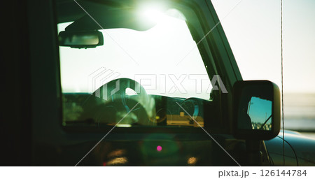Sunset, stop and car on road trip for outdoor adventure, transport and tourism with scenic view of ocean. Travel, journey and van window on drive in nature with beach for discovery, relax and holiday Sunset, stop and car on road trip for outdoor adventure, transport and tourism with scenic view of ocean. Travel, journey and van window on drive in nature with beach for discovery, relax and holiday 126144784