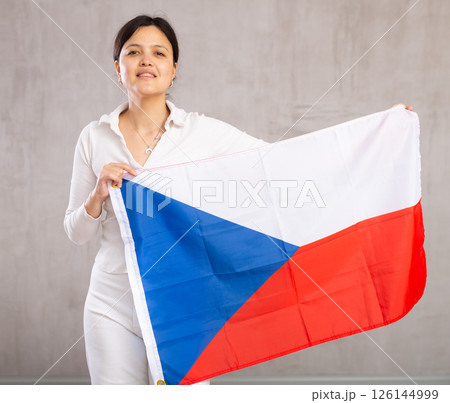 Happy young woman supporting Czech on world championship Happy young woman supporting Czech on world championship 126144999