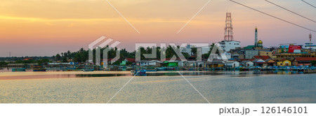 Boats in the harbor, panoramic shot at sunset, Mannar, Sri Lanka Boats in the harbor, panoramic shot at sunset, Mannar, Sri Lanka 126146101