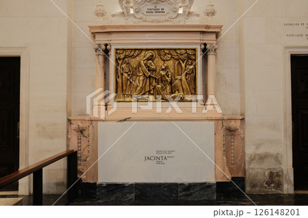 Tombs of Fatima visionaries inside Basilica of Our Lady of the Rosary at Sanctuary of Fatima Portugal religious resting place of Saint Francisco and Saint Jacinta Marto with inscriptions and sacred Tombs of Fatima visionaries inside Basilica of Our Lady of the Rosary at Sanctuary of Fatima Portugal religious resting place of Saint Francisco and Saint Jacinta Marto with inscriptions and sacred 126148201