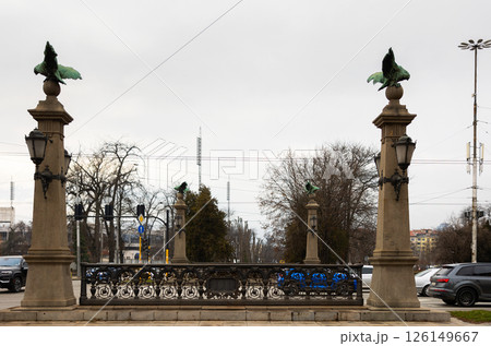 Busy traffic on ancient bridge over Perlovska River passes through Eagles Bridge. 126149667