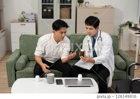 Stressed male patient are treated by a psychologist or psychiatrist in a psychiatric clinic or hospital. Patients reported symptoms of depression, stress, irritability, and life problems. 126149916