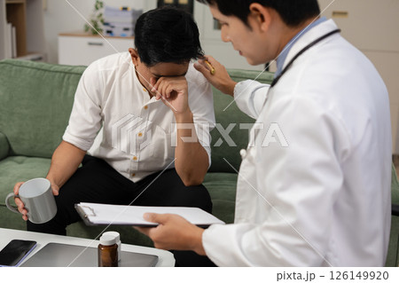 Stressed male patient are treated by a psychologist or psychiatrist in a psychiatric clinic or hospital. Patients reported symptoms of depression, stress, irritability, and life problems. 126149920
