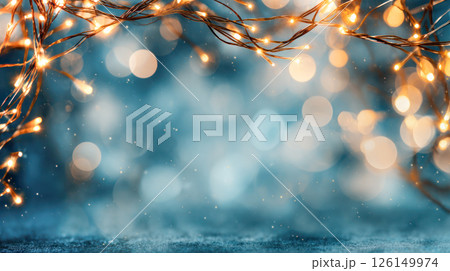 Twinkling fairy lights on branches create a magical atmosphere with blurred bokeh background 126149974