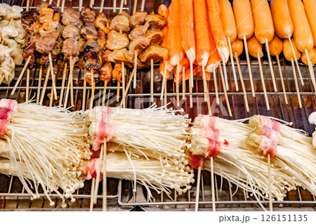 sausages seafood and grilled mushrooms on street food market 126151135
