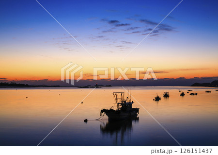Fishing boat on the morning sea 126151437