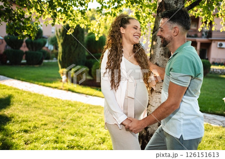 Expecting joy in a tranquil garden under bright sunlight 126151613